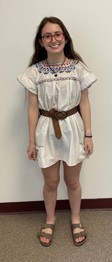 Chris Moody, a Cheyenne Mountain Junior, shows us her adorable dress and Birkenstocks as she is starting to dress for summer time.
Photo Credit: Merrill Delich