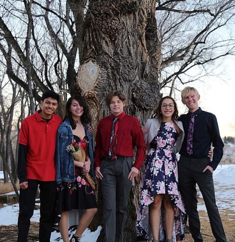 As the winter season blows around, so does the cold freezing air and snowy days. This season also brings with it Cheyenne Mountain’s annual Winter Dance. From left to right: Dante Lee, Jema Macaraeg, Lane Seabolt, Clara Johnson, and Tyler Nord traveled to Bear Creek Park for pre-dance photos.