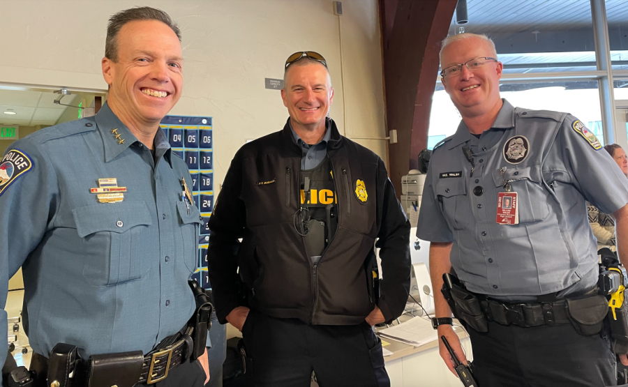 Deputy Chief Rigdon, Sgt. Bubacz, and SRO Walsh grin ear-to-ear while discussing over the breakfast organized by StuCo. 