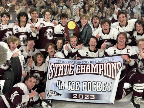 Cheyenne Mountain mens hockey celebrates their second consecutive State Champion win with the student section.